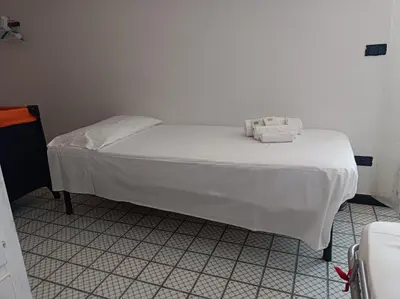 Letto o letti in una camera di CasaGiulia Calasetta