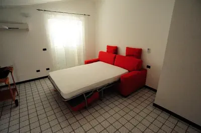 Letto o letti in una camera di CasaGiulia Calasetta