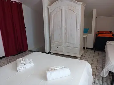 Letto o letti in una camera di CasaGiulia Calasetta