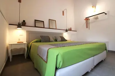 Letto o letti in una camera di Dimora Ferralasco