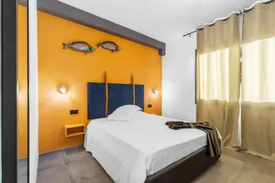 Letto o letti in una camera di BB OgliastRoom