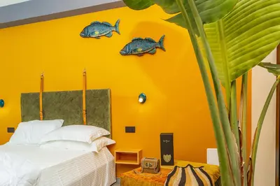 Letto o letti in una camera di BB OgliastRoom