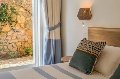 Letto o letti in una camera di Villa Perdas
