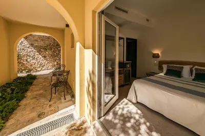 Letto o letti in una camera di Villa Perdas