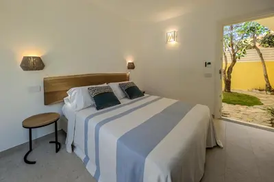 Letto o letti in una camera di Villa Perdas
