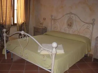 Letto o letti in una camera di Casa Nicola