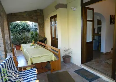 Area soggiorno di CASA CON VERANDA A POCHI PASSI DAL MARE