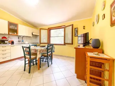 Cucina o angolo cottura di Torre di Chia Holiday Home IT11101CR