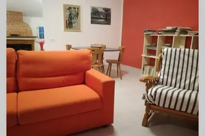 Area soggiorno di Big relax apartment with swimming pool and a peaceful garden in a private villa