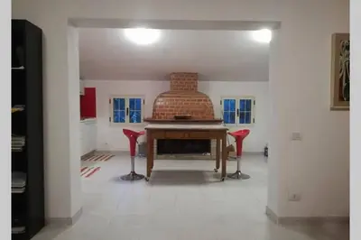 Planimetria di Big relax apartment with swimming pool and a peaceful garden in a private villa