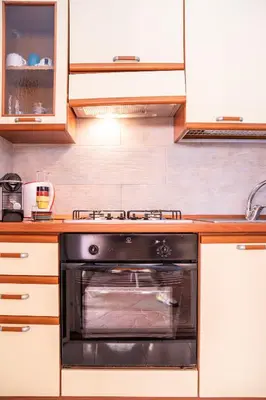 Cucina o angolo cottura di Casa Josto a due passi da Spiaggia Maladroxia