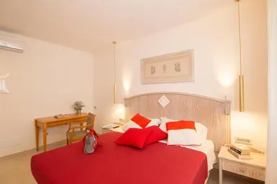 Letto o letti in una camera di Tabernabè