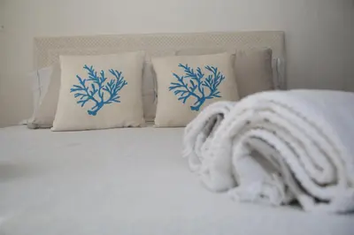 Letto o letti in una camera di Villa con discesa privata a mare