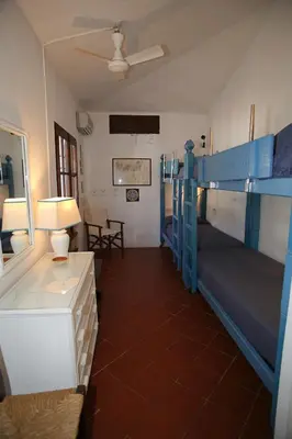 Letto o letti in una camera di Villa con discesa privata a mare