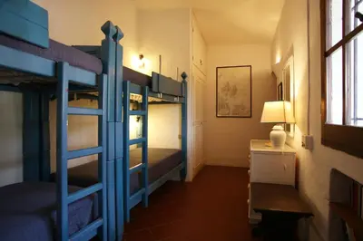 Letto o letti in una camera di Villa con discesa privata a mare
