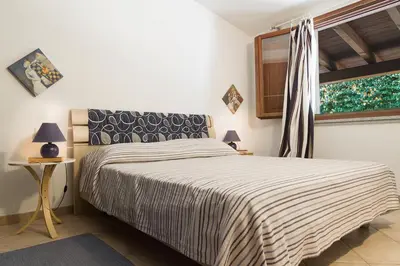Letto o letti in una camera di Casa Hedera with pool