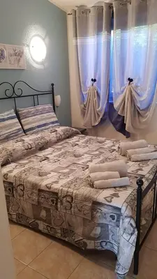 Letto o letti in una camera di Da Michele.