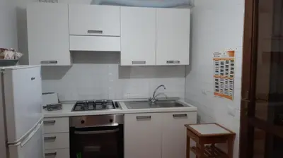 Cucina o angolo cottura di HOLIDAY HOME TORRE DELLE STELLE