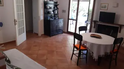 Cucina o angolo cottura di HOLIDAY HOME TORRE DELLE STELLE