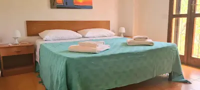 Letto o letti in una camera di HOLIDAY HOME TORRE DELLE STELLE