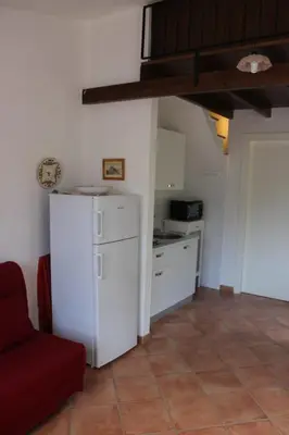 Cucina o angolo cottura di HOLIDAY HOME TORRE DELLE STELLE