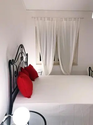 Letto o letti in una camera di Piana Apartment