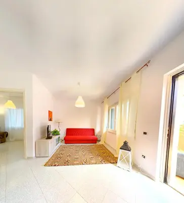 Letto o letti in una camera di Piana Apartment