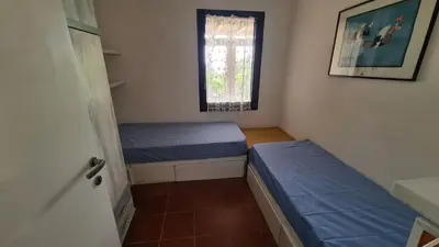 Letto o letti in una camera di Terrazze al Mare (Urlaub an Sardiniens Westküste)