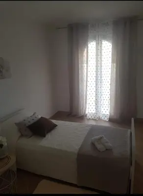 Letto o letti in una camera di La Casa Delle Rose 2
