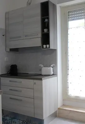 Cucina o angolo cottura di Smile - appartamento con giardino