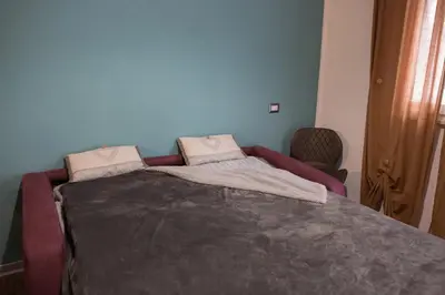Letto o letti in una camera di La Casetta