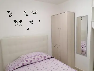 Letto o letti in una camera di LUX IUN Q2026