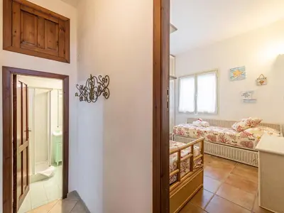 Letto o letti in una camera di Casa Flamingo 150m dal mare