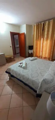Letto o letti in una camera di la Via del Mare
