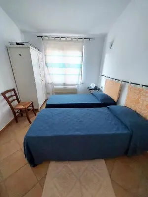 Letto o letti in una camera di Nuova Valmar Villa le Rondini