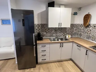 Cucina o angolo cottura di Casa Chia a 5 minuti dal mare - Su Giudeu Tuerredda