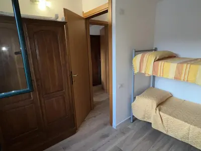 Letto o letti in una camera di Casa Chia a 5 minuti dal mare - Su Giudeu Tuerredda