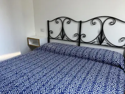 Letto o letti in una camera di Casa Chia a 5 minuti dal mare - Su Giudeu Tuerredda