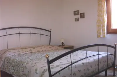 Letto o letti in una camera di Casa a 300mt.dal mare CalaSinzias, 6 letti, AC, Pets welcome, Wi-Fi free