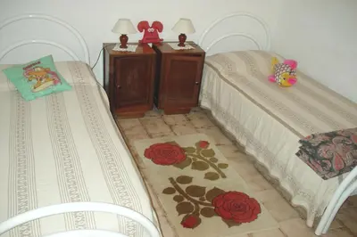 Letto o letti in una camera di Casa a 300mt.dal mare CalaSinzias, 6 letti, AC, Pets welcome, Wi-Fi free