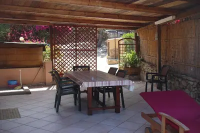 Ristorante o altro punto ristoro di Casa a 300mt.dal mare CalaSinzias, 6 letti, AC, Pets welcome, Wi-Fi free