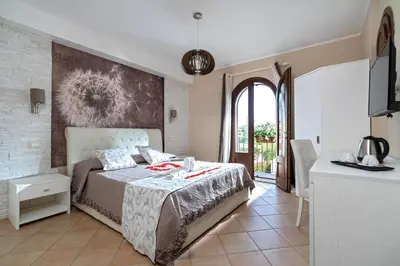 Letto o letti in una camera di Villa Lina