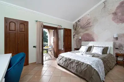 Letto o letti in una camera di Villa Lina