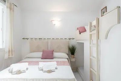 Letto o letti in una camera di ⭑ ⭑ ⭑ ⭑ ⭑ Jewel on the seafront promenade