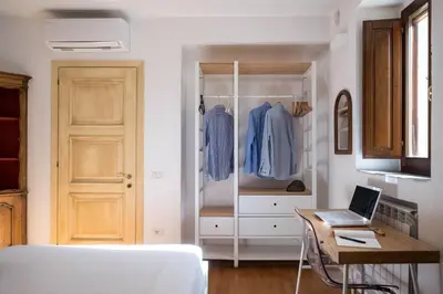Letto o letti in una camera di Domus De Gorga - Your Sardinian Apartment