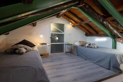 Letto o letti in una camera di Domus De Gorga - Your Sardinian Apartment
