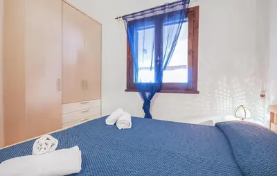 Letto o letti in una camera di 1 Bedroom Stunning Apartment In Costa Rei -Ca-