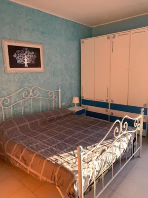 Letto o letti in una camera di Casa accogliente