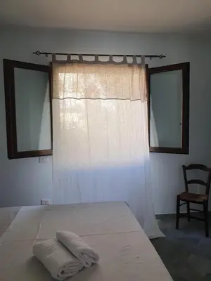 Letto o letti in una camera di Villino del Pepe Rosa