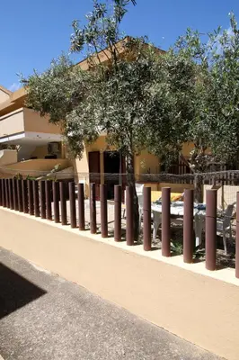 Balcone o terrazza di Villetta Simiri caposchiera con cortile e BBQ
